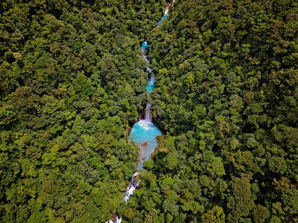 Rio Celeste Waterfall & Tenorio Volcano National Park Guide Aerial